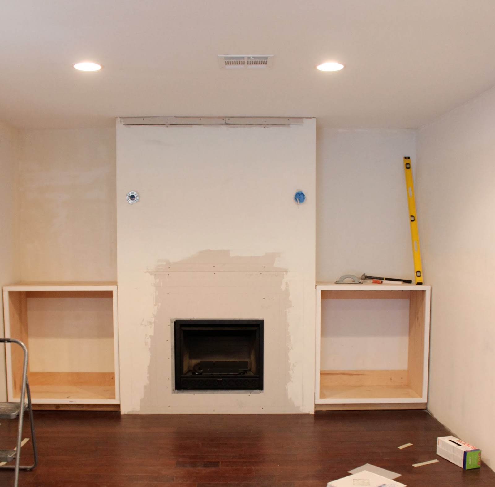 builtin shelves around fireplace For the Home