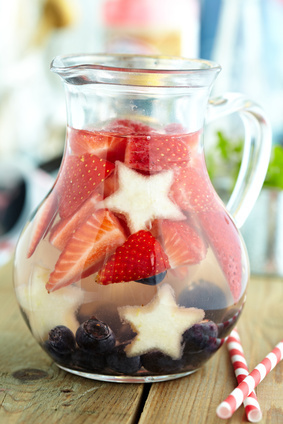 Red, white and blue lemonade with strawberry, blueberry and pear